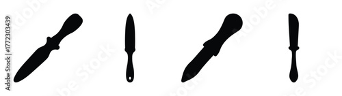 Four black silhouettes of knives and cutlery on a