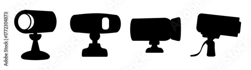 Collection of four black silhouette icons of cameras and projectors on a white background, representing different types of optical devices and recording equipment