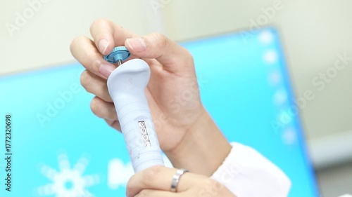 Researcher holding a laboratory instrument in a science lab. Represents scientific research, experiment, testing, and modern laboratory technology. Suitable for education, innovation, and scientific c