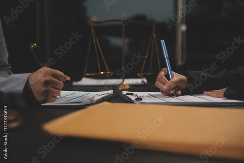 Law theme, mallet of the judge, law enforcement officers, evidence-based cases and documents taken into account.