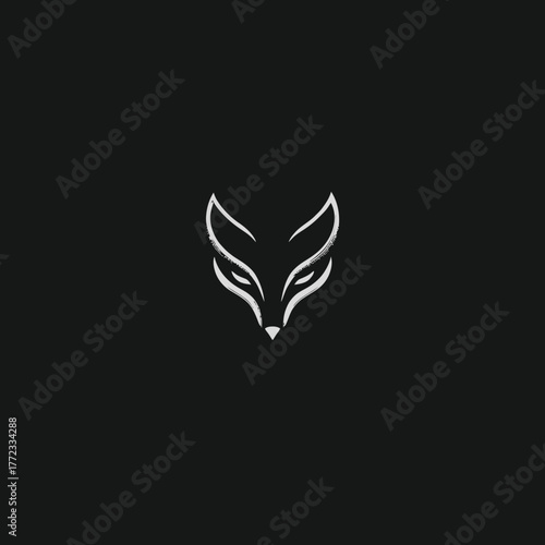 Sleek minimalist fox head logo design on dark background. Stylized abstract animal illustration for modern branding.