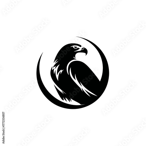 Majestic black vector eagle logo in a circular design, symbolizing strength, freedom, and power. Stylized bird of prey graphic.