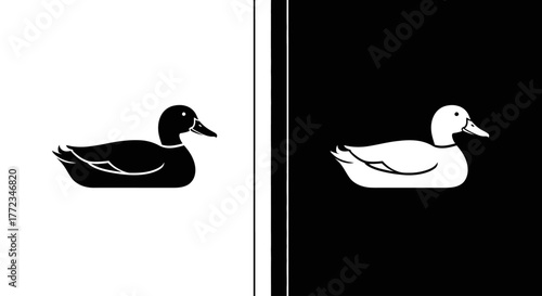 A minimalist split-screen design featuring a black duck silhouette on a white background and its white inverse on a black background.