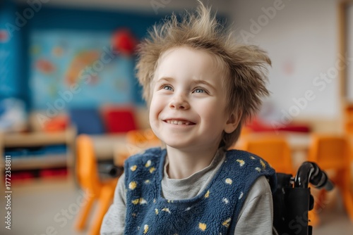Smiling young boy with special needs at rehabilitation center for children with disabilities