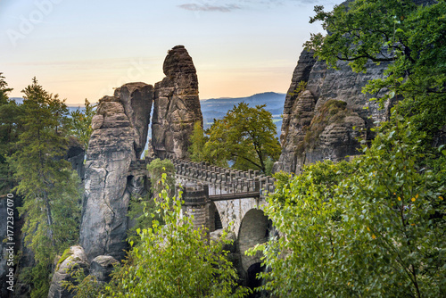 Historic Stone Bridge Connecting Sandstone Formations in Elbe Sandstone Mountains, Germany.