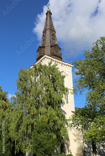Tower with Clocks of The Karlstad Cathedral with Blue Sky Background in Karlstad, Sweden