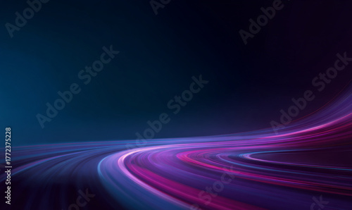 Dynamic light trails curve and twist above dark roads, forming futuristic patterns that capture speed and motion in neon colors.