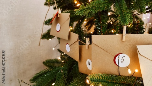 Preparing an Advent calendar for Christmas. Eco-craft envelopes with numbers for children. Christmas background, Advent from small craft envelopes.