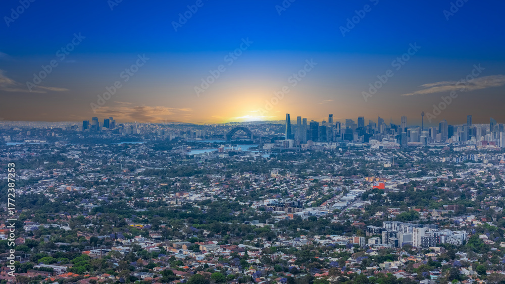 Obraz premium Panorama Sunset aerial drone view of western Sydney Suburbs of Canterbury Burwood Ashfield Marrickville Campsie with Houses roads and parks in Sydney New South Wales NSW Australia