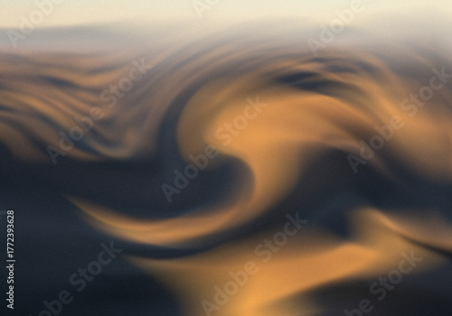 Golden Hour Desert Dunes Landscape with Mountains, Sand Ripples and Dramatic Shadows