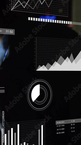 Animation of infographic interface over caucasian businessman working over tablet in office at night