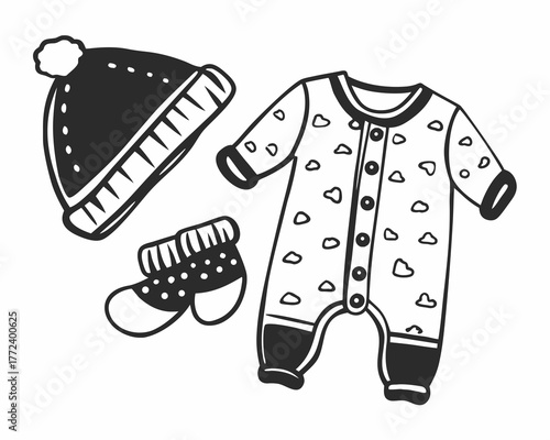 Baby clothes including a hat, onesie, and booties