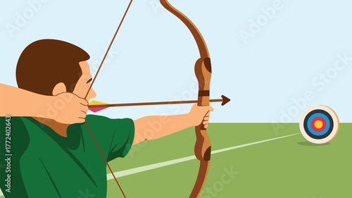 A man in green shirt aiming arrow with bow at target in outdoor archery practice on green field