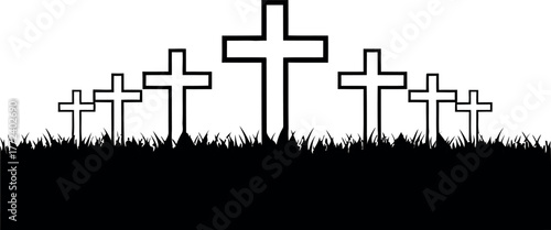 Silhouette of multiple christian crosses standing in grass against a white background