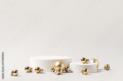 Christmas product presentation scene with white round podium and scattered gold baubles on clean background - elegant festive mockup for product, gift, and holiday display.