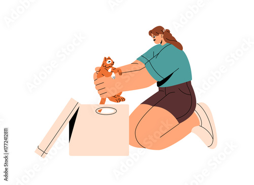 Happy girl takes ginger kitten out of cardboard box. Young woman adopts little kitty to care and love it. Person holds cute cat, rejoices to get it in gift. Flat isolated vector illustration on white