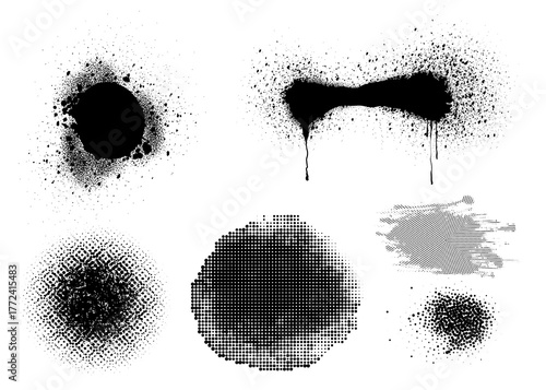 Set of abstract paint splatters and spray effects with grunge texture