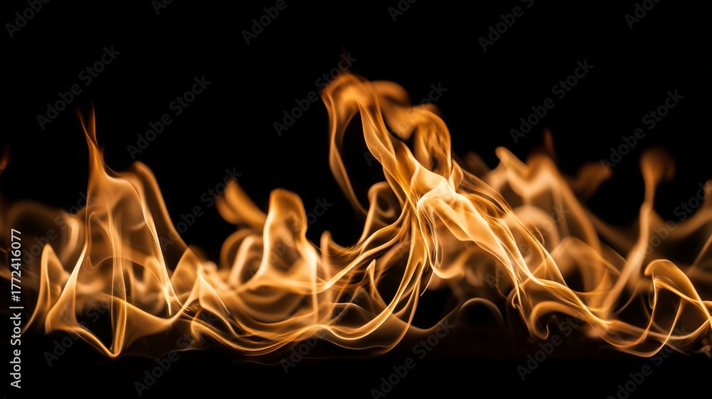 Fototapeta premium Dynamic and Lively Flames in Motion Against a Black Background Highlighting the Intensity and Beauty of Fire in a Captivating Display of Light and Color