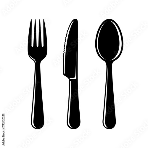 Cutlery set - fork, knife, and spoon for dining.