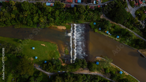 Aerial view of the Water flowing from the dam in Malaysia.