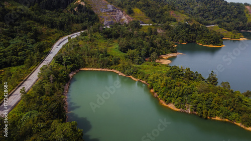 Green lake and rainforest tropical trees in Kuala Kubu Bharu, Malaysia.