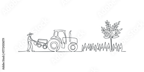 Farmer planting seed with tractor and planter machine