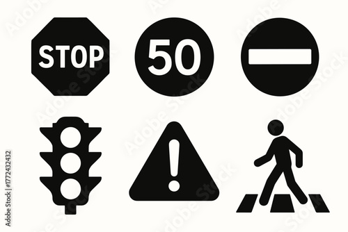 Essential traffic and road signs in simple black silhouette design