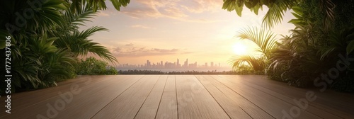Serene cityscape view from tropical wooden terrace at sunset