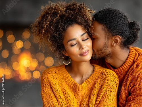 couple cuddling by the fire...
