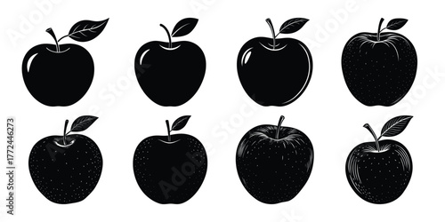 Collection of eight black apple silhouettes with leaves on a white background