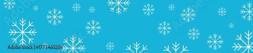 New Year snowflakes on a blue background, falling snow, Christmas and holiday