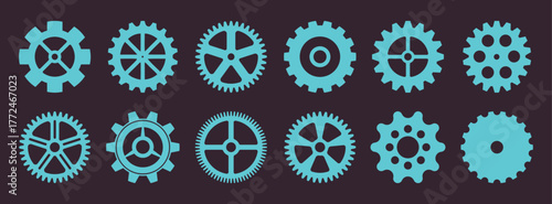 Collection of blue gears and cogs on a dark background, industrial design elements