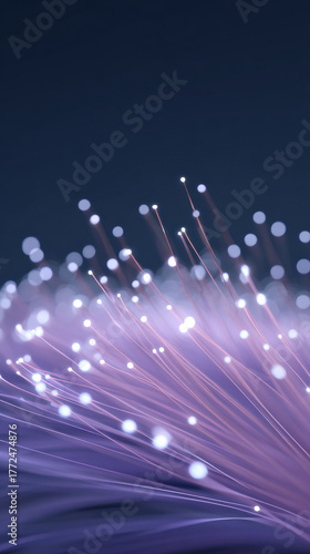 Abstract background of glowing purple fiber optic cable showing modern technology. Light beams represent data communication, network speed, and future innovation with feeling of wonder