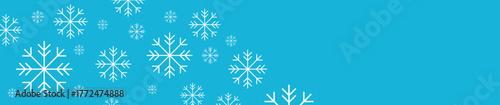 New Year snowflakes on a blue background, falling snow, Christmas and holiday	