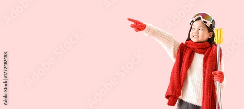 Little Asian girl with ski ...