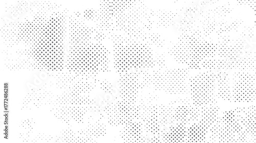 Grey dots scattered on white background abstract pattern black circle
