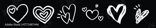 A Collection of Hand-Drawn White Hearts on a Black Background