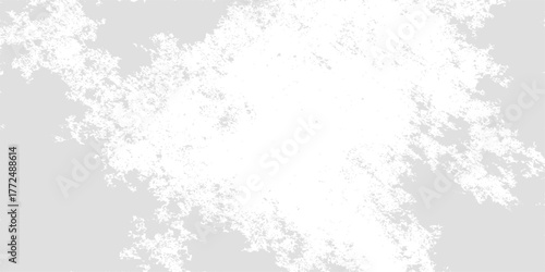 Abstract grunge background featuring a black ink splat and an overall dirty, vintage textured design with a gray, icy wall pattern