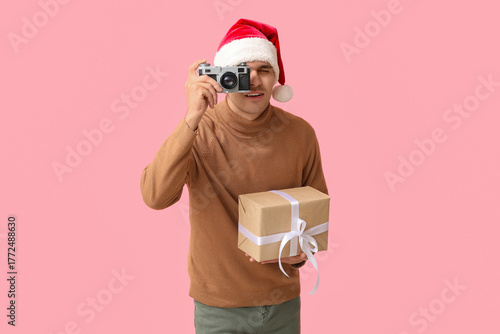 Handsome young man in Santa...