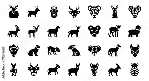 Solid black glyph icon set of various horned and antlered mammals like deer, goats, and antelopes for web and print