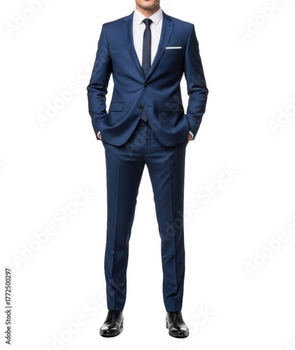 A man in a blue suit standing confidently with hands in pockets, against transparent background