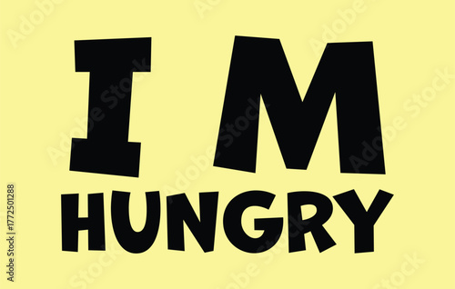 Black text saying i m hungry on a yellow background with bold sans serif font and slightly tilted letters