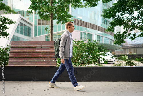 Man walking outdoors in urban office area
