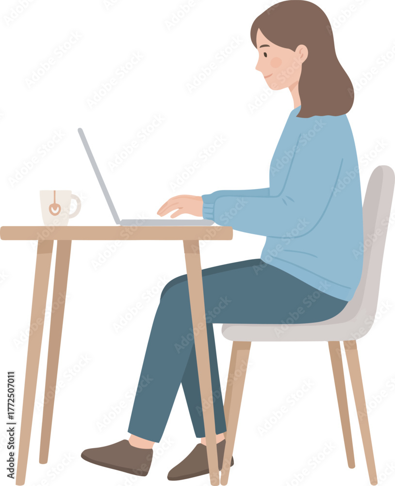 Fototapeta premium A woman sits at a table, working on a laptop, with a cup of tea.