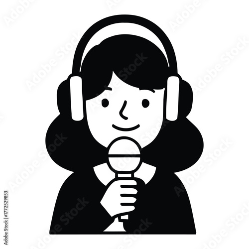 Cheerful female voice talent with headphones holding a microphone for production