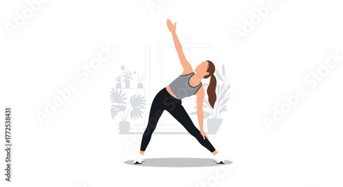 Fit woman practicing yoga triangle pose in bright minimalist home studio surrounded by lush green plants