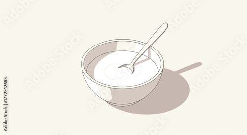 Smooth creamy yogurt in a simple bowl with a spoon, ready for a healthy breakfast or light snack