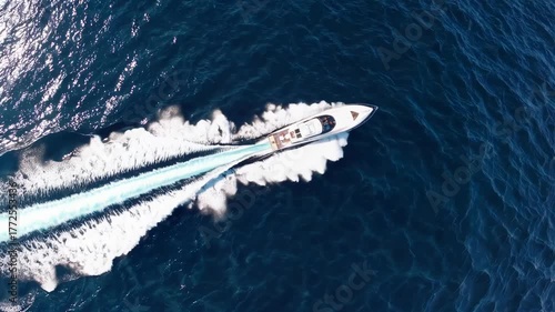 Speeding across the clear blue ocean on a sunny day in a powerful motorboat
