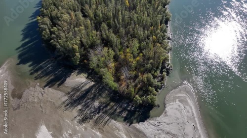 Aerial down video of a luch river island on the Danube.