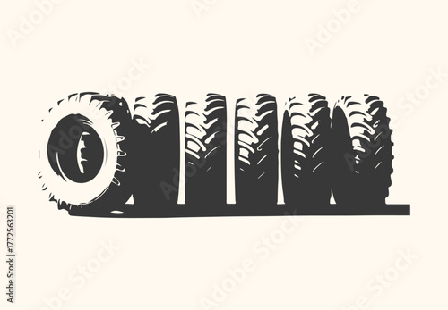 A row of tractor tires, isolated on a light background